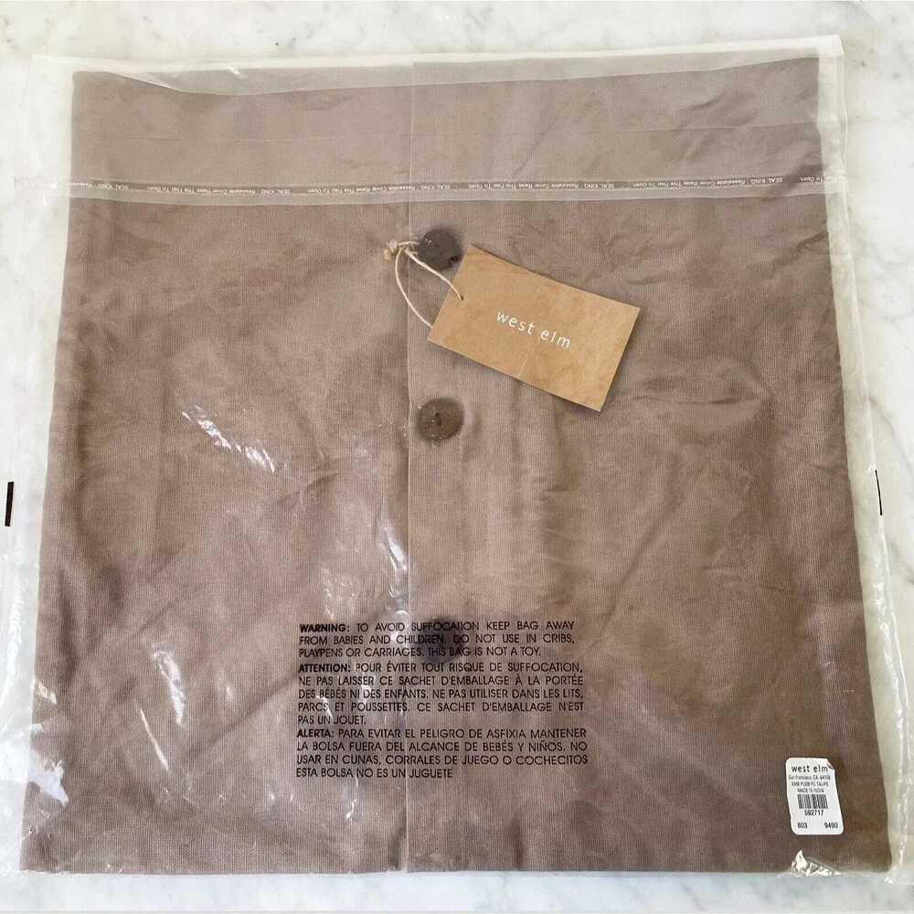 West Elm tags navy embroidered